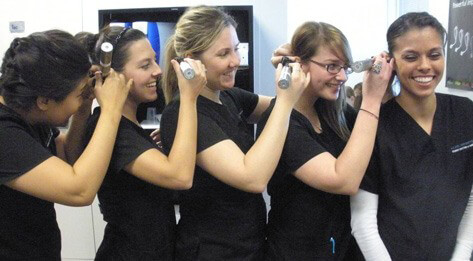 Audiology students collaborating and working together.
