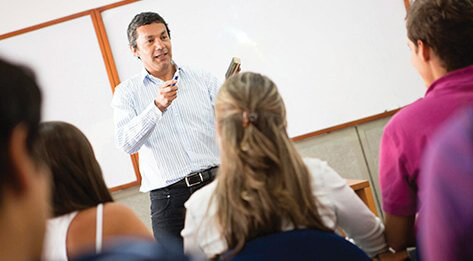 Professor engaging and teaching Doctor of Health Education students.