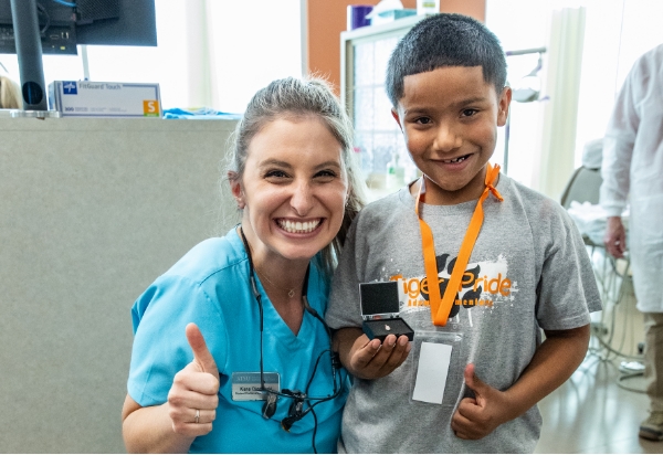 Doctors with a happy patient