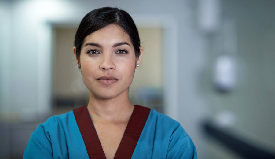 diverse nurse in scrubs