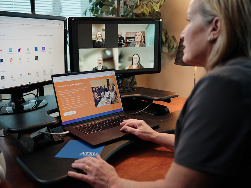 Healthcare professionals discussing together at a conference table, emphasizing collaboration and teamwork in the healthcare field.