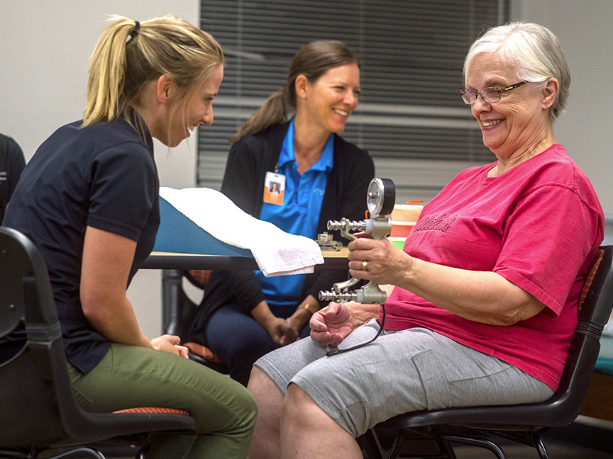 OT helping a patient