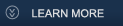Downward facing arrows enclosed in a circle, accompanied by the text "learn more"