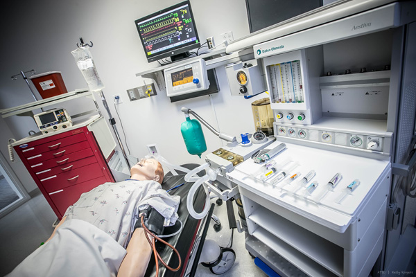 Human patient simulator with equipment