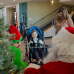 ATSU-ASHS Occupational Therapy department hosts holiday switch-adapted toy event
