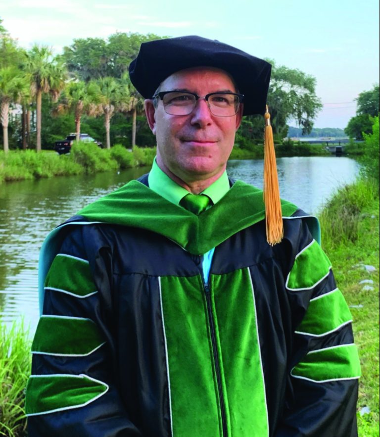 Dr. Carl Whalen in regalia