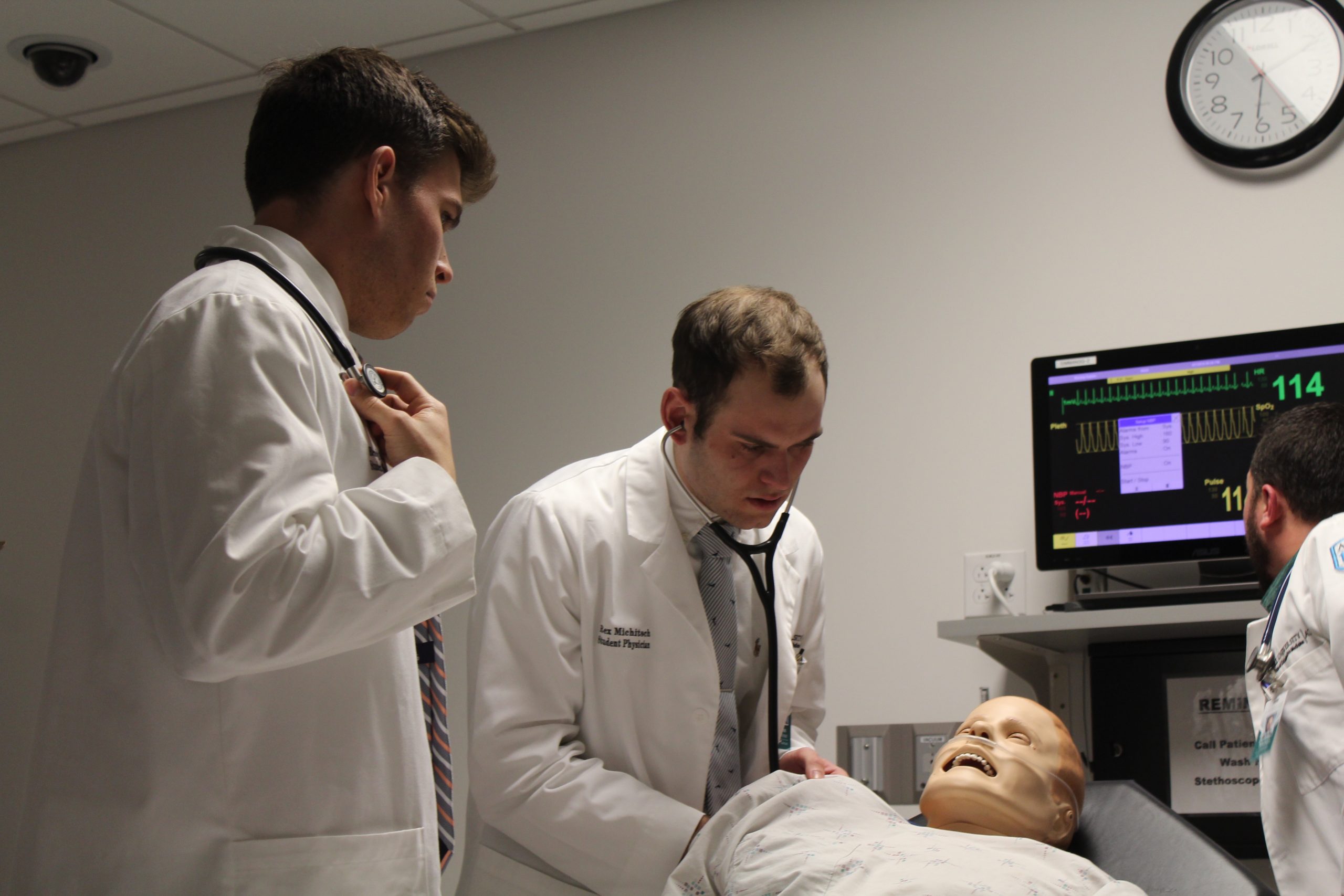 Students working with human patient simulator