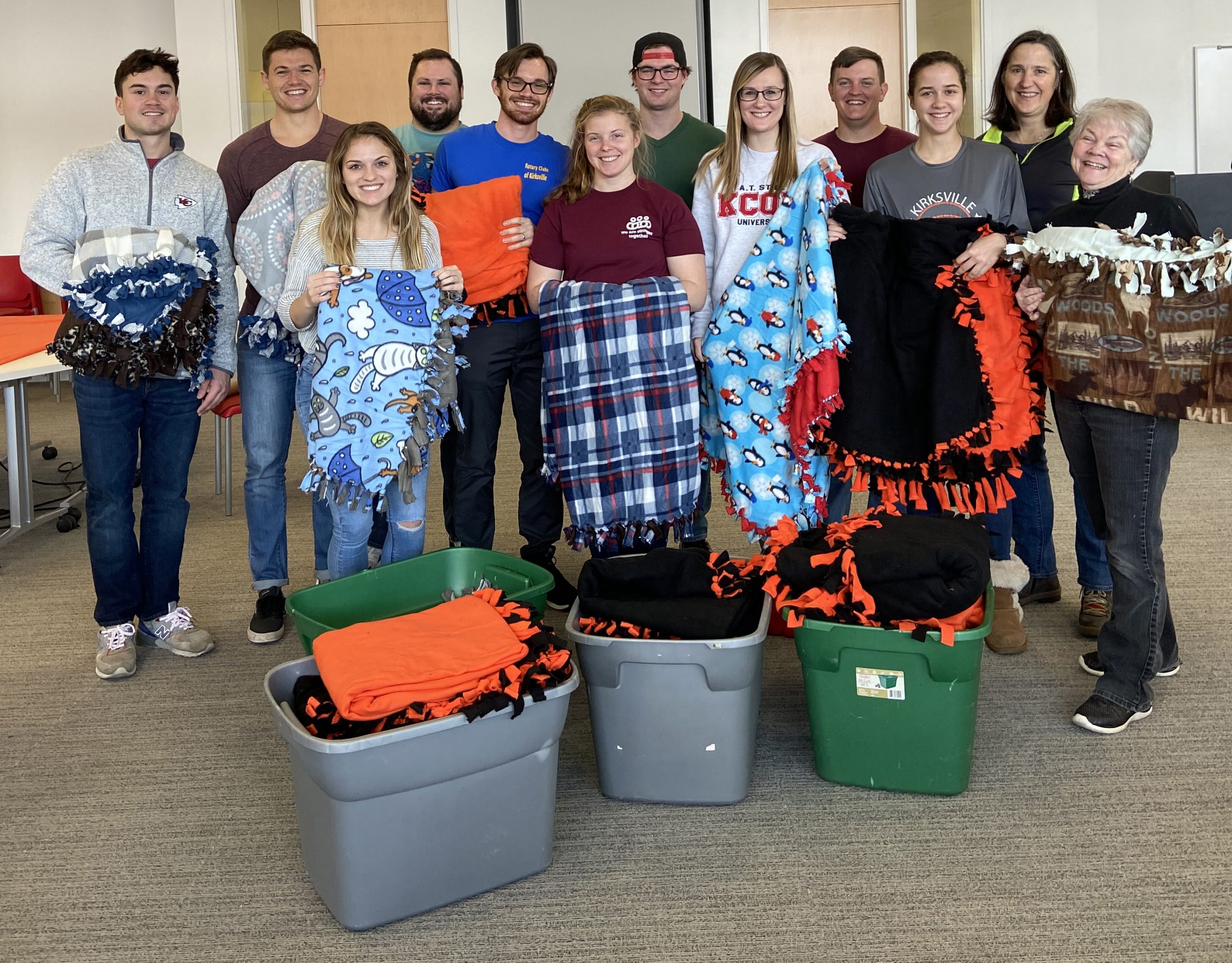 Volunteers with the A.T. Still University Rotaract Club pose with blankets