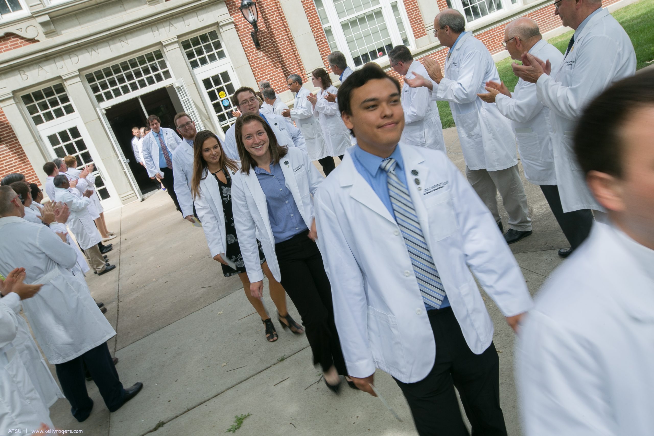 Students walking from ceremony