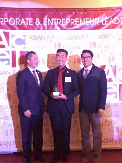 Michael Chang receives the Member of the Year Award from ACEL