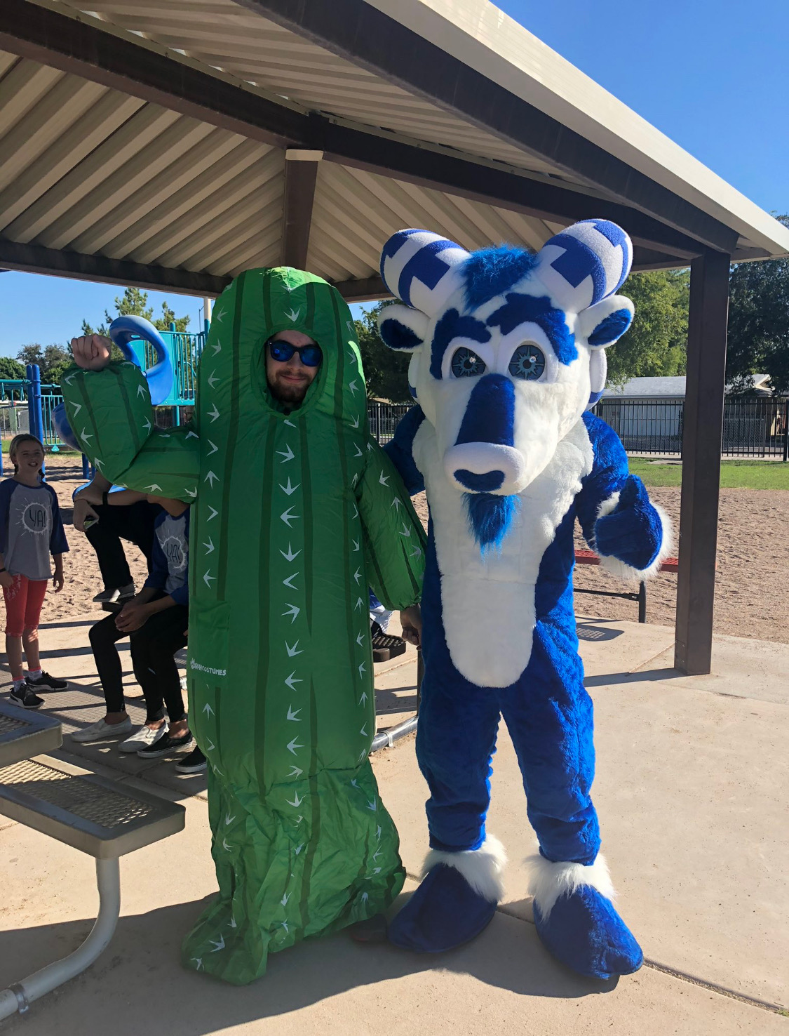 Bucky the Ram of Reason with an inflated cactus at a Mesa parks event