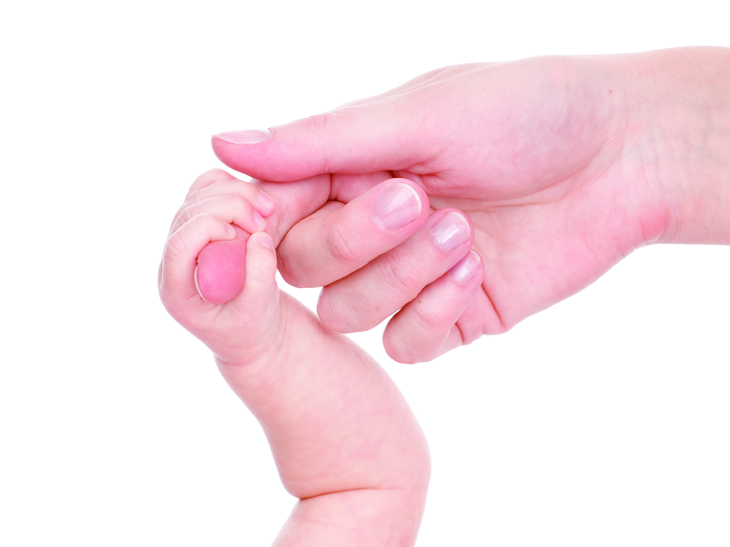 baby hand holding mother's finger