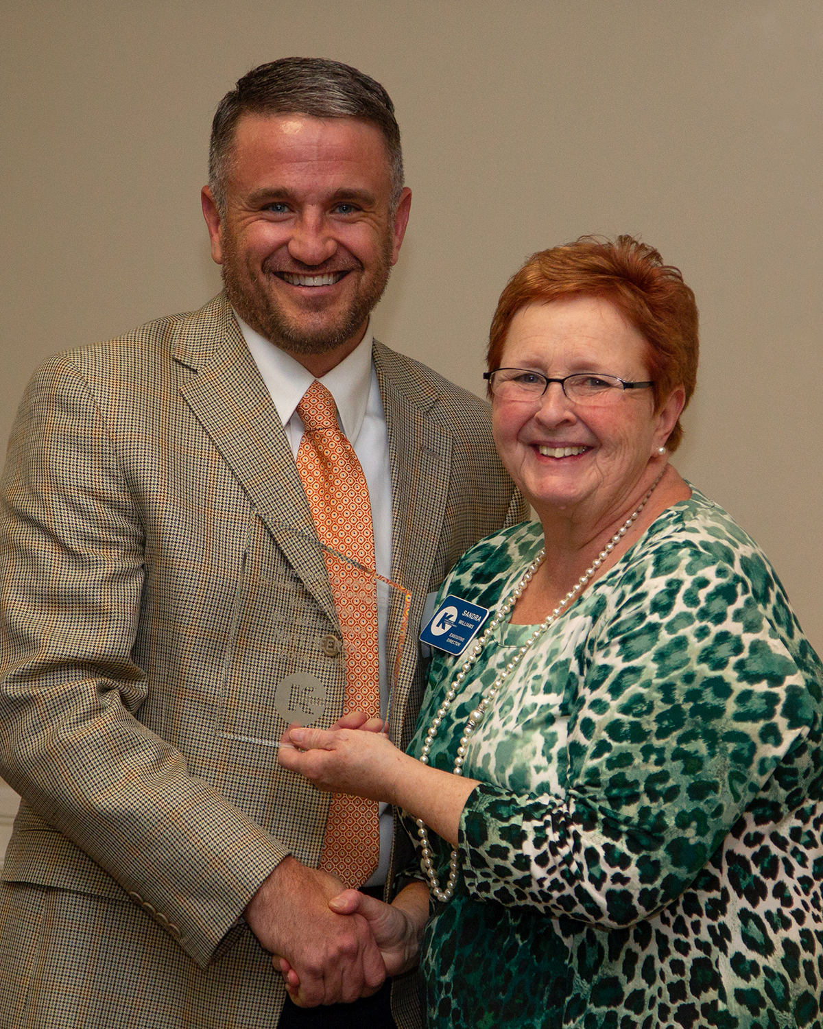 Matthew R. Heeren, JD, vice president & general counsel for A.T. Still University of Health Sciences (ATSU), receives an award for service to the Kirksville Area Chamber of Commerce.