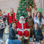 ATSU-ASHS OT department spreads festive cheer with switch-adapted toy giveaway