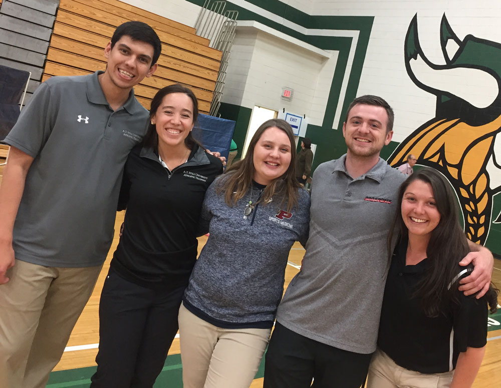 ATSU athletic training students at a physicals event