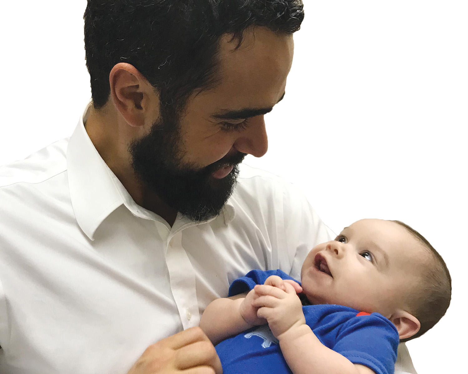 Dr. Chad Taylor holds a young patient