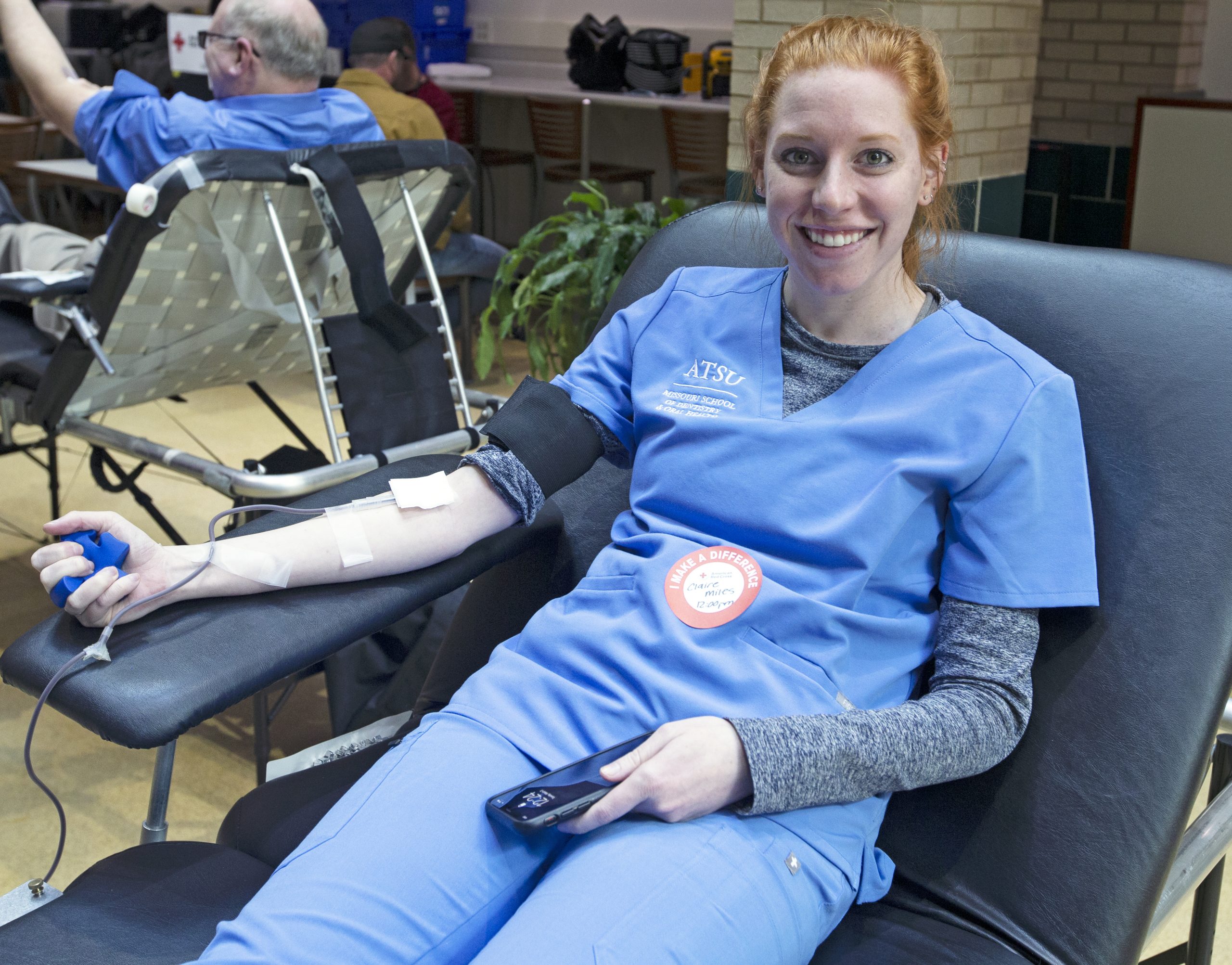 ATSU-MOSDOH student Claire Miles, D2, smiles as she donates blood
