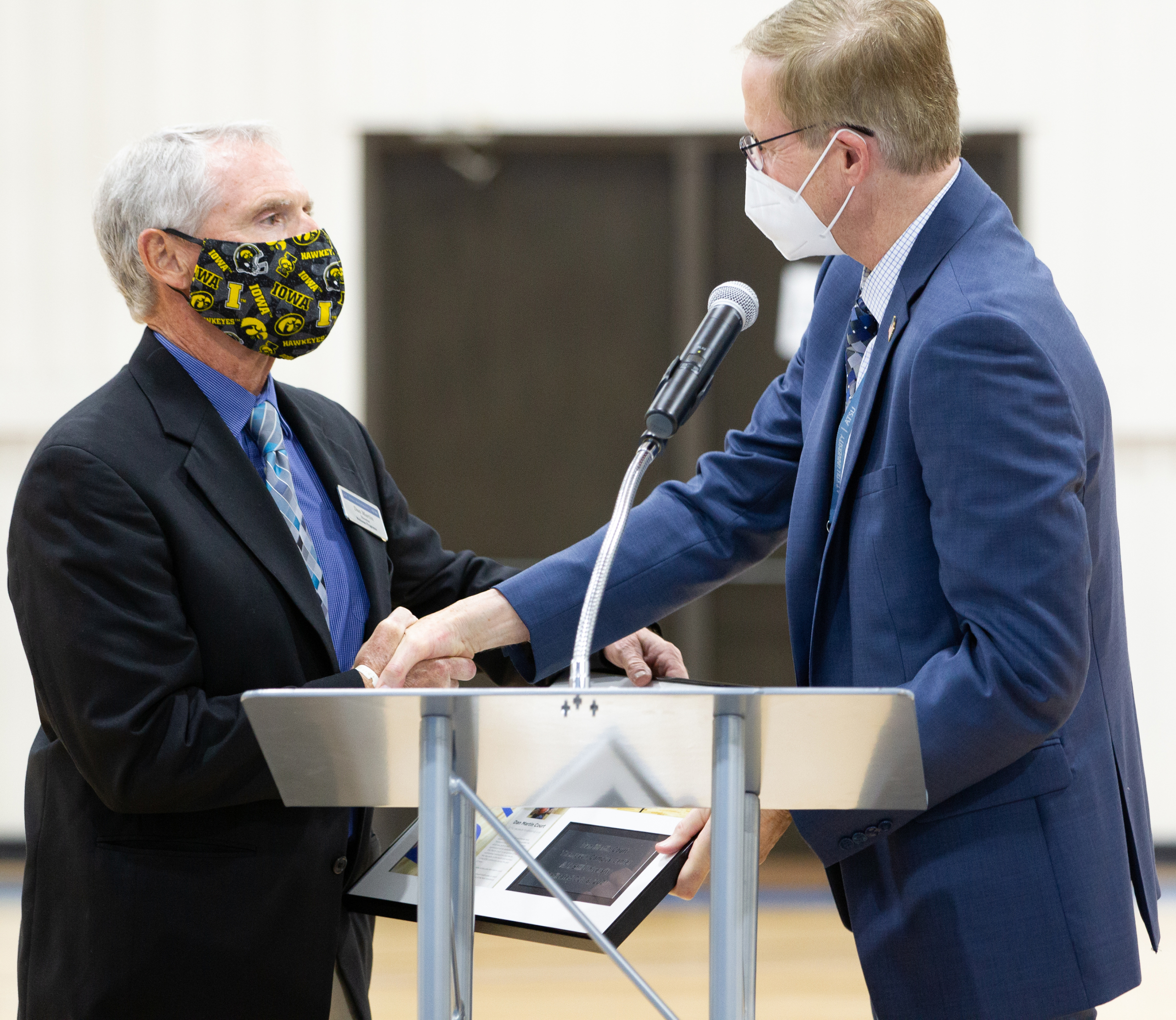 A.T. Still University President Dr. Craig Phelps congratulates Dan Martin