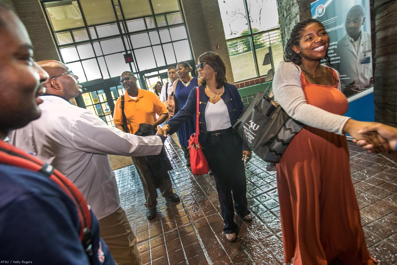 Leaders being greeted by ATSU representatives.