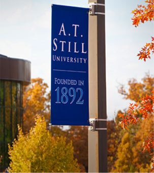 Photo of ATSU vertical banner on pole outside